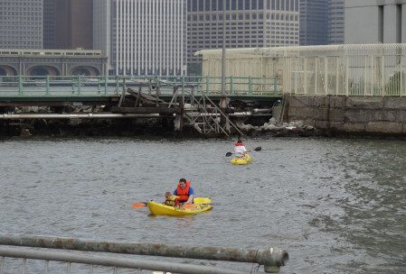 kayak the East River and get great views of downtown NYC - Explore NYC with us - https://www.nyctechmommy.com/my-city-play-in-new-york-city-summer-series/