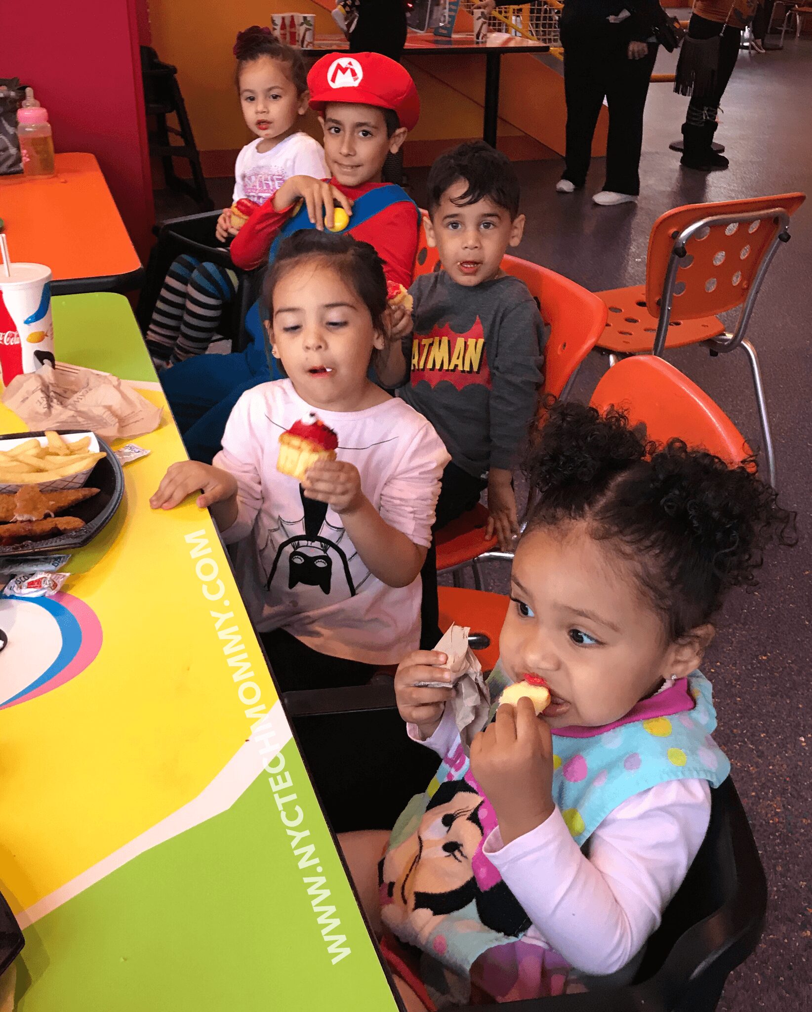 Eating Elmo cupcakes - Sesame Place