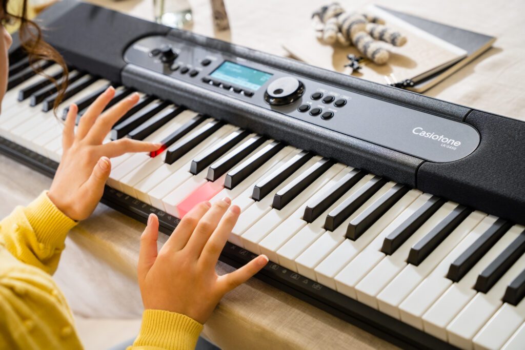 NEW Casiotone LK-S450 - digital keyboard for beginners with key lighting for easy play + lessons